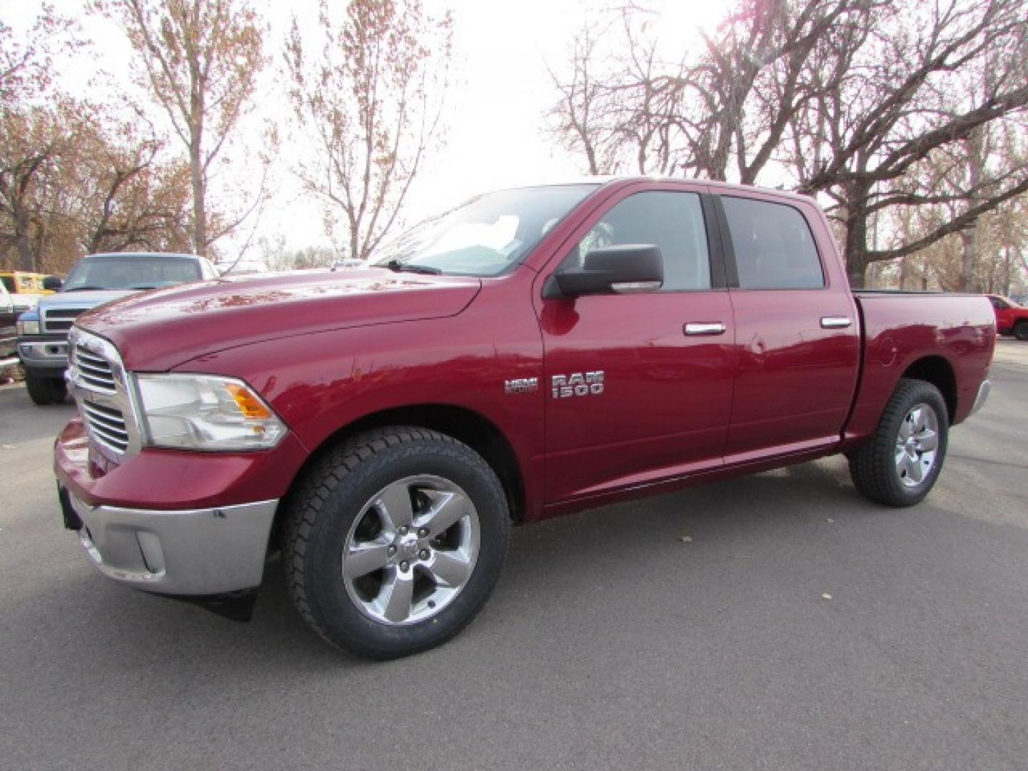 2015 Red /Gray RAM 1500 (1C6RR7LT7FS) with an 5.7 Hemi V8 engine engine, 8 speed automatic transmission, located at 4562 State Avenue, Billings, MT, 59101, (406) 896-9833, 45.769516, -108.526772 - 2015 RAM 1500 SLT Crew Cab SWB 4WD - Bighorn Edition! 5.7L V8 OHV 16V Hemi Engine - 8 speed automatic transmission - 4WD - 115,339 miles - Inspected and serviced - copy of inspection and all work performed as well as complete vehicle history report provided SLT Bighorn package - Luxury group - - Photo#0